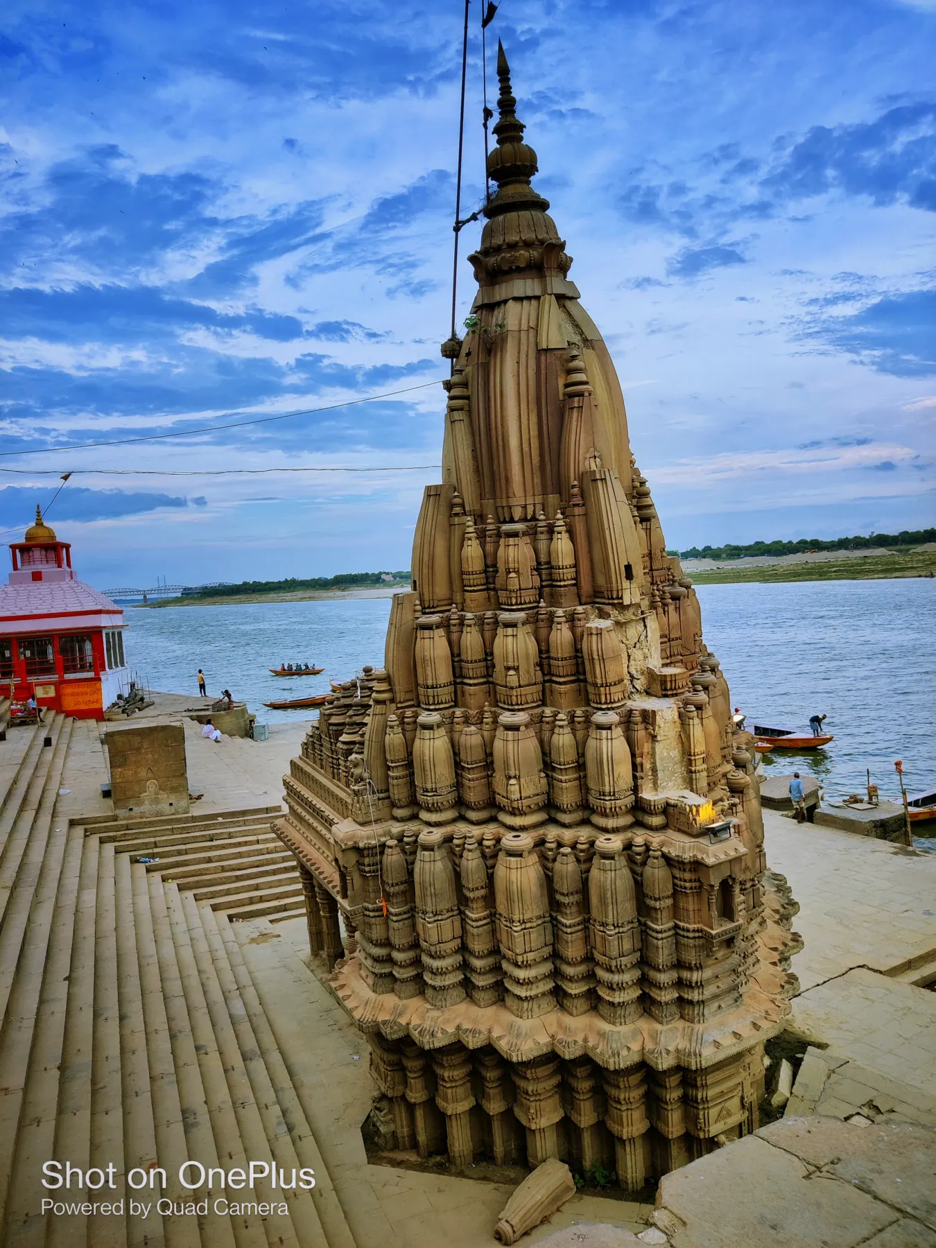 The leaning Ratneshwar Mahadev temple beside the river
